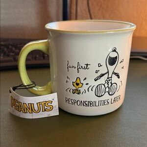 Peanuts Mug with Green Handle and Snoopy Design